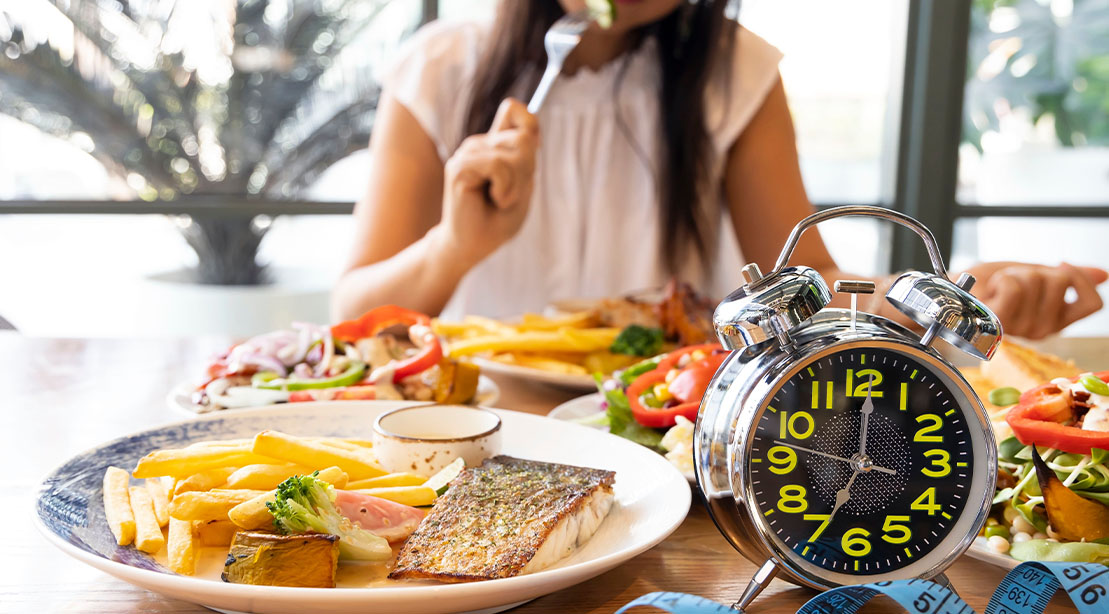 Female meal timing her food intake for health purposes